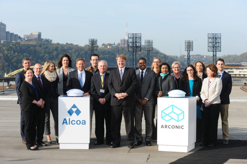 board of directors posing for Alcoa and Arconic event