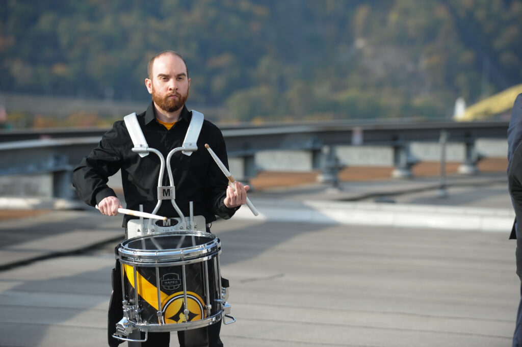 drummer for corporate name change unveiling for Alcoa and Arconic event